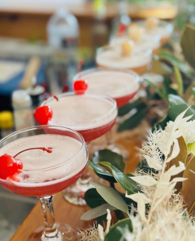 Signature pink cocktails with custom branded ice cubes